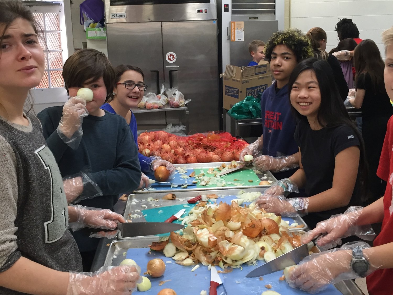 GrowingSOUL participants take food that might otherwise be wasted and turn it into something delicious for all. These students attend the Oneness Family School in Chevy Chase, MD.